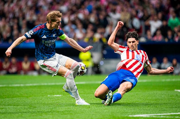 UEFA Champions League - Atletico de Madrid v ARSENAL FC. Semi-final, first leg match. UEFA Champions League - Atletico de Madrid v Arsenal FC.Arsenal FC s Martin Odegaard and Atletico de Madrid s Johnny Cardoso during Champions League 2025 2026, semi-final, first leg match.April 29, 2026 (ALTERPHOTOS Tomas Garrido) MadridSpain  Copyright: xTomasxGarridox
