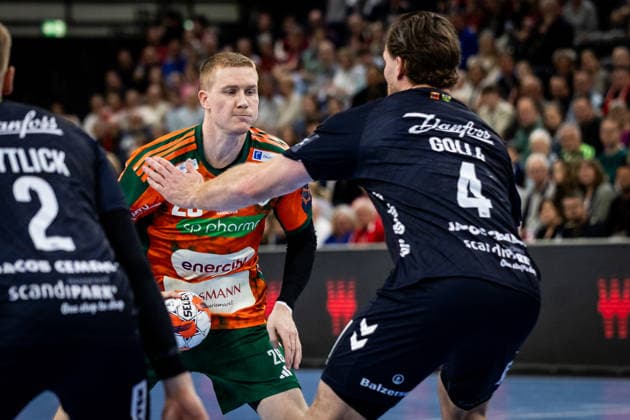 FLENSBURG, GERMANY - APRIL 29: Jonathan Edvardsson (Recken - TSV Hannover-Burgdorf, 26) against Johannes Golla (SG Flensburg-Handewitt, 04) during the EHF European League quarter-final match between SG Flensburg-Handewitt vs Recken - TSV Hannover-Burgdorf at GP JOULE Arena, on matchday April 29, 2026 in Flensburg, Germany. Schleswig-Holstein Germany Copyright: xMarioxM.xKobergx