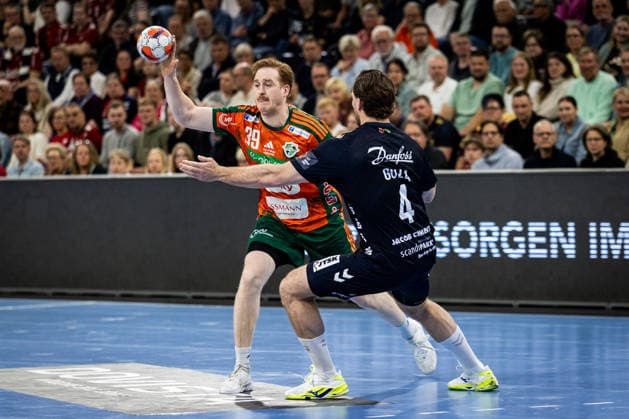 FLENSBURG, GERMANY - APRIL 29: Lukas Stutzke (Recken - TSV Hannover-Burgdorf, 39) against Johannes Golla (SG Flensburg-Handewitt, 04) during the EHF European League quarter-final match between SG Flensburg-Handewitt vs Recken - TSV Hannover-Burgdorf at GP JOULE Arena, on matchday April 29, 2026 in Flensburg, Germany. Schleswig-Holstein Germany Copyright: xMarioxM.xKobergx