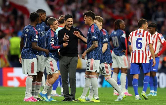 Arsenal manager Mikel Arteta celebrates with his players at full time Atletico Madrid v Arsenal, UEFA Champions League, Semi Final, First Leg, Football, Riyadh Air Metropolitano, Madrid, Spain - 29 Apr 2026Madrid Riyadh Air Metropolitano Spain EDITORIAL USE ONLY No use with unauthorised audio, video, data, fixture lists, club league logos or live services. Online in-match use limited to 120 images, no video emulation. No use in betting, games or single club league player publications.  Copyright: xKieranxMcManus Shutterstockx 16847970bf