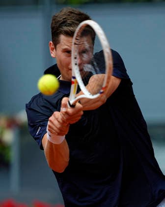 2026 Mutua Madrid Open in Madrid - 30 Apr 2026 Alexander Blockx of Belgium plays against Casper Ruud of Norway (not in view) during the Men’s Singles quarter-final match of the 2026 Mutua Madrid Open at La Caja Magica. Madrid Spain Copyright: xGokhanxTanerx xSOPAxImagesx GTANER_SOPAImages_MutuaMadridOpenTennis_Madrid_ESP_30042026_00007