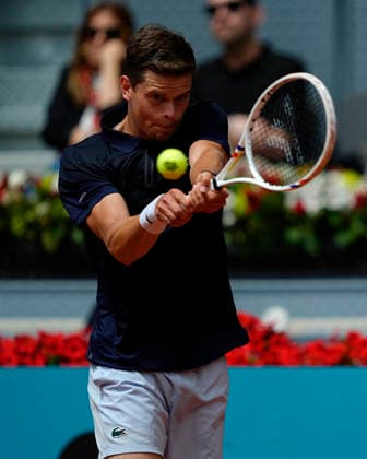 April 30, 2026, Madrid, Spain: Alexander Blockx of Belgium plays against Casper Ruud of Norway (not in view) during the Men™s Singles quarter-final match of the 2026 Mutua Madrid Open at La Caja Magica. 2026 Mutua Madrid Open In Madrid - 30 Apr 2026  - ZUMAs197 20260430_aaa_s197_013 Copyright: xGokhanxTanerx