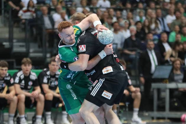 Handball DAIKIN HBL, SC DHfK Leipzig HC Erlangen 30 04 2026 Tomas Piroch 7, SC DHfK Leipzig is stopped by Maciej Gebala 77, HC Erlangen Handball, DAIKIN HBL, 1 Bundesliga, Season 2025 2026, Matchday 30 SC DHfK Leipzig vs HC Erlangen on 30 04 2026 at Quarterback Immobilien Arena Leipzig Copyright: xBEAUTIFULxSPORTS JanxKaeferx