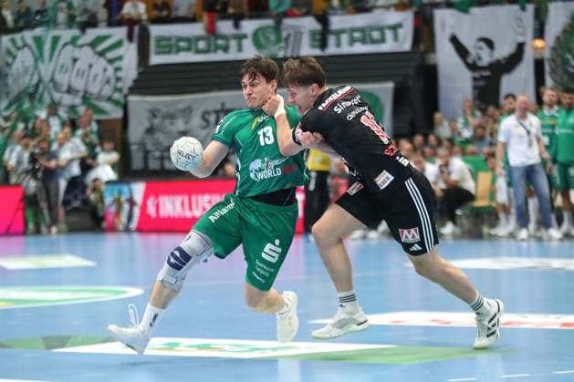 Handball DAIKIN HBL, SC DHfK Leipzig HC Erlangen 30 04 2026 Matej Klima 13, SC DHfK Leipzig is grabbed by Florian Scheerer 10, HC Erlangen Handball, DAIKIN HBL, 1 Bundesliga, Season 2025 2026, Matchday 30 SC DHfK Leipzig vs HC Erlangen on 30 04 2026 at Quarterback Immobilien Arena Leipzig Copyright: xBEAUTIFULxSPORTS JanxKaeferx
