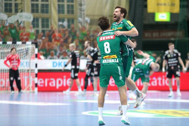 Handball DAIKIN HBL, SC DHfK Leipzig HC Erlangen 30 04 2026 Lukas Binder 11, SC DHfK Leipzig cheers with Lucas Krzikalla 8, SC DHfK Leipzig about the home victory Handball, DAIKIN HBL, 1 Bundesliga, Season 2025 2026, Matchday 30 SC DHfK Leipzig vs HC Erlangen on 30 04 2026 at Quarterback Immobilien Arena Leipzig Copyright: xBEAUTIFULxSPORTS JanxKaeferx