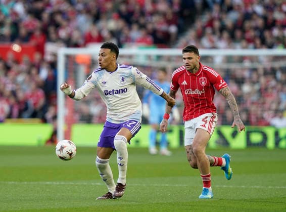 Nottingham, England, 30th April 2026. Morgan Rogers of Aston Villa (l) and Morato of Nottingham Forest (r) during the Nottingham Forest vs Aston Villa UEFA Europa League Semi Final 1st leg match at the City Ground, Nottingham. Picture credit should read: Andrew Yates Sportimage EDITORIAL USE ONLY. No use with unauthorised audio, video, data, fixture lists, club league logos or live services. Online in-match use limited to 120 images, no video emulation. No use in betting, games or single club league player publications. SPI_036_AY_Forest_Villa SPI-4767-0036