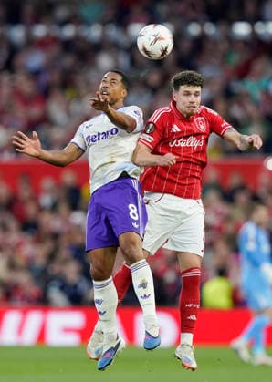 Nottingham, England, 30th April 2026. Youri Tielemans of Aston Villa (l) challenges Neco Williams of Nottingham Forest (r) during the Nottingham Forest vs Aston Villa UEFA Europa League Semi Final 1st leg match at the City Ground, Nottingham. Picture credit should read: Andrew Yates Sportimage EDITORIAL USE ONLY. No use with unauthorised audio, video, data, fixture lists, club league logos or live services. Online in-match use limited to 120 images, no video emulation. No use in betting, games or single club league player publications. SPI_043_AY_Forest_Villa SPI-4767-0043