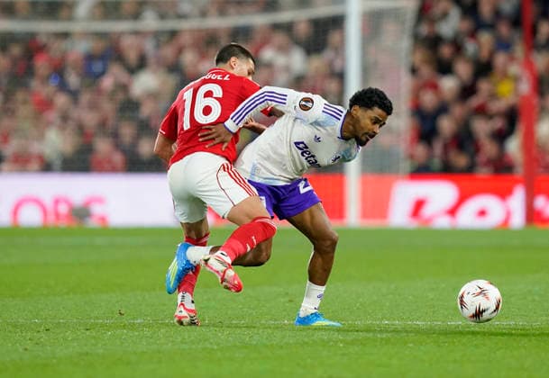 Nottingham, England, 30th April 2026. Nicolas Dominguez of Nottingham Forest (l) tackles Ian Maatsen of Aston Villa (r) during the Nottingham Forest vs Aston Villa UEFA Europa League Semi Final 1st leg match at the City Ground, Nottingham. Picture credit should read: Andrew Yates Sportimage EDITORIAL USE ONLY. No use with unauthorised audio, video, data, fixture lists, club league logos or live services. Online in-match use limited to 120 images, no video emulation. No use in betting, games or single club league player publications. SPI_053_AY_Forest_Villa SPI-4767-0053