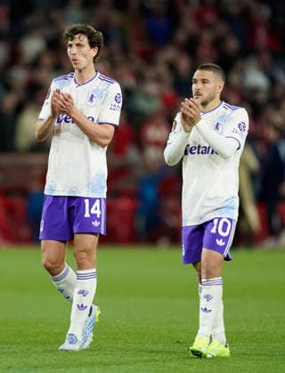 Nottingham, England, 30th April 2026. Pau Torres of Aston Villa and Emiliano Buendia of Aston Villa applaud the fans during the Nottingham Forest vs Aston Villa UEFA Europa League Semi Final 1st leg match at the City Ground, Nottingham. Picture credit should read: Andrew Yates Sportimage EDITORIAL USE ONLY. No use with unauthorised audio, video, data, fixture lists, club league logos or live services. Online in-match use limited to 120 images, no video emulation. No use in betting, games or single club league player publications. SPI_063_AY_Forest_Villa SPI-4767-0063