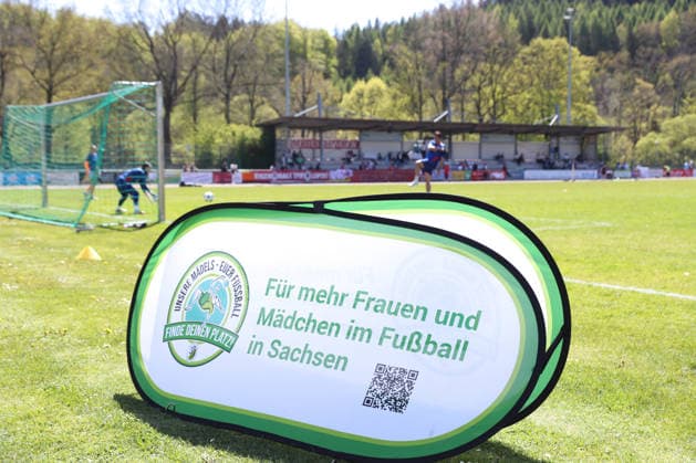 Saxony Cup Final Women Chemnitzer FC RB Leipzig II 01 05 2026 Advertising, public relations, display for more women and girls in soccer with the pitch and stands in the background Symbolic image, feature Saxony Cup Final Women Saxony Lotto State Cup Chemnitzer FC vs RB Leipzig II U20 at Auenstadion Flöha, 01 05 2026 Copyright: xBEAUTIFULxSPORTS JanxKaeferx