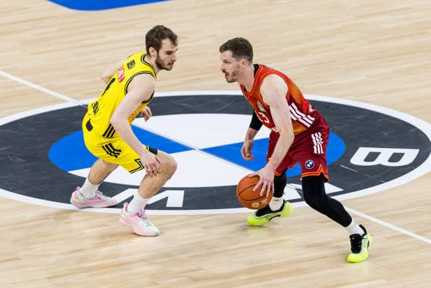 MUNICH, GERMANY - MAY 01: Andreas Andi Obst (FC Bayern Muenchen, 13) controls the ball against Malte Delow (Alba Berlin, 6) during the easyCredit Basketball Bundesliga match between FC Bayern Muenchen vs. Alba Berlin at SAP Garden on matchday 27 of the easyCredit Basketball Bundesliga on May 01, 2026 in Munich, Germany. Bavaria Germany Copyright: xSteffiexWunderlx