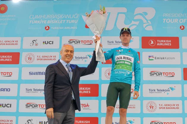 The 61st Presidential Cycling Tour of Turkiye (TUR 2026) has officially begun, starting with its opening stage in the coastal town of Cesme, Izmir. Held under the auspices of the Presidency of the Republic of Türkiye, this prestigious UCI ProSeries race brings together 23 teams and 161 world-class cyclists to compete over eight days, from April 26 to May 3, 2026...The 2026 edition unfolds across routes showcasing some of Türkiye s most striking landscapes. Starting in Cesme, the race follows the Aegean and Mediterranean coastlines, covering stages through Antalya and the southern shores before concluding in the capital, Ankara. Beyond sporting competition, the tour plays a key role in promoting Türkiye s natural and cultural richness on a global stage..This year, the race consists of 8 stages covering approximately 1,200 kilometers. Nearly 20 teams and over 150 riders from around the world are competing, under the coordination of the Turkish Cycling Federation..With the first three stages completed, the pace in the peloton has intensified and the general classification has begun to take shape. Sprint finishes and technically demanding routes have stood out, with the third stage drawing attention for its high tempo and dramatic finale..The third stage of the 61st Presidential Cycling Tour of Türkiye (TUR 2026) was won by Colombian rider Ivan Ramiro Sosa of Equipo Kern Pharma. Covering the 132.7-kilometer Marmaris-KÄÂ±ran route, Sosa finished in 3 hours, 40 minutes, and 25 seconds. In the summit finish, Australian rider Sebastian Berwick of Caja Rural-Seguros RGA placed second, while French rider Nicolas Breuillard of TotalEnergies finished third..As the race progresses, challenging climbs and critical time gaps are expected to further heighten the excitement. The tour continues to deliver a compelling blend of elite competition and global vis Copyright: RizaxOzel 19081558