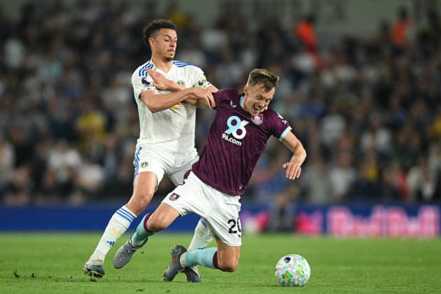 Leeds, England, 1st May 2026. Ethan Ampadu of Leeds United jostles for the ball against James Ward-Prowse of Burnley during the Leeds United vs Burnley Premier League match at Elland Road, Leeds. Picture credit should read: Harriet Massey Sportimage EDITORIAL USE ONLY. No use with unauthorised audio, video, data, fixture lists, club league logos or live services. Online in-match use limited to 120 images, no video emulation. No use in betting, games or single club league player publications. SPI_059_LEEDS_v_BURNLEY SPI-4768-0059