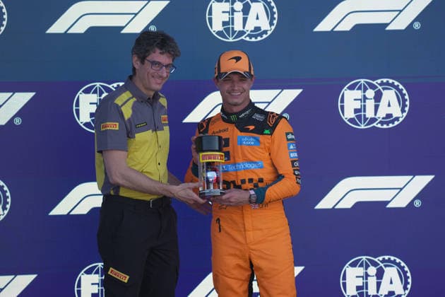 Formula 1 Crypto com Miami Grand Prix 2026 01 05 2026, Miami International Autodrome, Miami, Formula 1 Crypto com Miami Grand Prix 2026 ,pictured Pirelli Head of Motorsport Dario Marrafuschi presents the trophy for fastest in qualifying to Lando Norris GBR , McLaren Mastercard F1 Team nordphotoxGmbHx xBratic nph00250