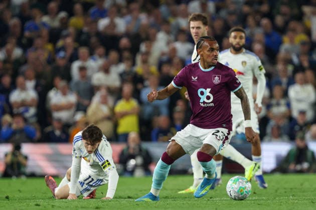 1st May 2026; Elland Road, Leeds, Yorkshire, England; Premier League Football, Leeds United versus Burnley; Lucas Pires of Burnley runs on the ball after escaping a challenge from Brenden Aaronson of Leeds United AidanxHunter