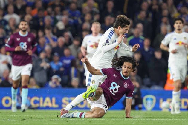 1st May 2026; Elland Road, Leeds, Yorkshire, England; Premier League Football, Leeds United versus Burnley; Brenden Aaronson of Leeds United is challenged by Hannibal Mejbri of Burnley AidanxHunter