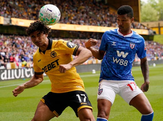 Wolverhampton, England, 2nd May 2026. Pedro Lima of Wolverhampton Wanderers (L) is challenged by Reinildo Mandava of Sunderland during the Wolverhampton Wanderers vs Sunderland Premier League match at Molineux, Wolverhampton. Picture credit should read: Andrew Yates Sportimage EDITORIAL USE ONLY. No use with unauthorised audio, video, data, fixture lists, club league logos or live services. Online in-match use limited to 120 images, no video emulation. No use in betting, games or single club league player publications. SPI_013_AY_WOLVES_SUNDERLAND SPI-4772-0013