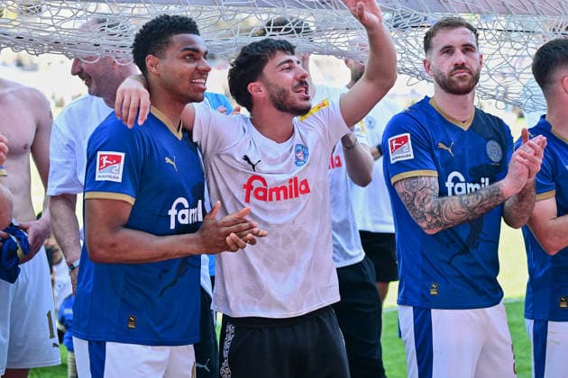 02 05 2026, Football, Men, 2 BL Bundesliga , Season 2025 2026, Holstein Kiel Eintracht Braunschweig, 32 Matchday Ikem Ugoh, Umut Tohumcu and Marco Komenda Holstein Kiel celebrates relegation Kiel, Holstein Stadion Holstein Stadion Schleswig Holstein Germany