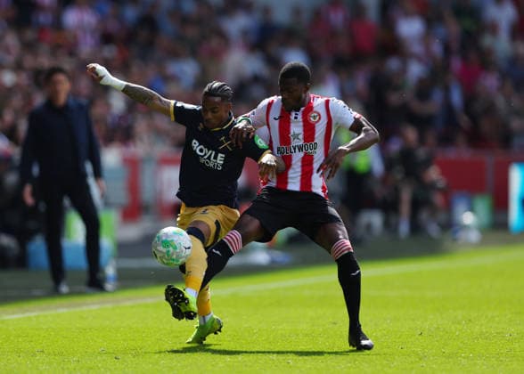 2nd May 2026; Gtech Community Stadium, Brentford, London, England; Premier League Football, Brentford versus West Ham United; Crysencio Summerville of West Ham United under pressure from Dango Ouattara of Brentford JPxFletcher