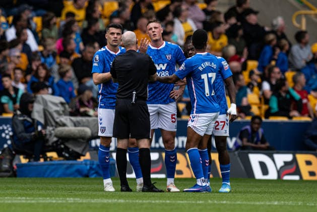 2nd May 2026; Molineux Stadium, Wolverhampton, West Midlands, England; Premier League Football, Wolverhampton Wanderers versus Sunderland; Referee Paul Tiernery issues a red card to Daniel Ballard of Sunderland AFC for violent conduct GodfreyxPitt