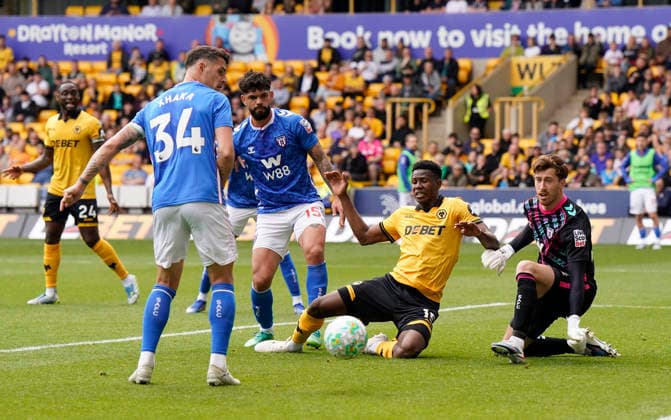 Wolverhampton, England, 2nd May 2026. Yerson Mosquera of Wolverhampton Wanderers (2R) has his effort saved during the Wolverhampton Wanderers vs Sunderland Premier League match at Molineux, Wolverhampton. Picture credit should read: Andrew Yates Sportimage EDITORIAL USE ONLY. No use with unauthorised audio, video, data, fixture lists, club league logos or live services. Online in-match use limited to 120 images, no video emulation. No use in betting, games or single club league player publications. SPI_021_AY_WOLVES_SUNDERLAND SPI-4772-0020