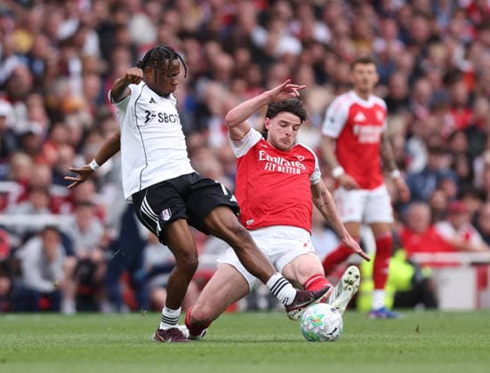 London, England, 2nd May 2026. Declan Rice of Arsenal tackles Calvin Bassey of Fulham during the Arsenal vs Fulham Premier League match at the Emirates Stadium, London. Picture credit should read: David Klein Sportimage EDITORIAL USE ONLY. No use with unauthorised audio, video, data, fixture lists, club league logos or live services. Online in-match use limited to 120 images, no video emulation. No use in betting, games or single club league player publications. SPI_033_DK_Arsenal_Fulham SPI-4774-0034