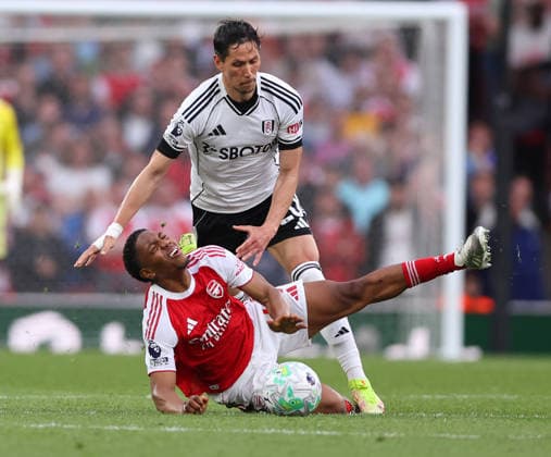 London, England, 2nd May 2026. Myles Lewis-Skelly of Arsenal stopped by Sasa Lukic of Fulham during the Arsenal vs Fulham Premier League match at the Emirates Stadium, London. Picture credit should read: David Klein Sportimage EDITORIAL USE ONLY. No use with unauthorised audio, video, data, fixture lists, club league logos or live services. Online in-match use limited to 120 images, no video emulation. No use in betting, games or single club league player publications. SPI_035_DK_Arsenal_Fulham SPI-4774-0035
