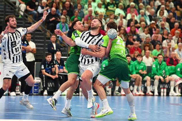 Harald Reinkind THW Kiel, 06 in duel with Ahmed Nafea HSG Wetzlar, 79, left and Jona Schoch HSG Wetzlar, 22 GER, HSG Wetzlar vs THW Kiel, Handball, 1 Bundesliga, Matchday 30, Season 2025 2026, 02 05 2026 GER, HSG Wetzlar vs THW Kiel, Handball, 1 Bundesliga, Matchday 30, Season 2025 2026, 02 05 2026 Wetzlar Copyright: xEibner-Pressefoto RenexWeissx EP_RWS
