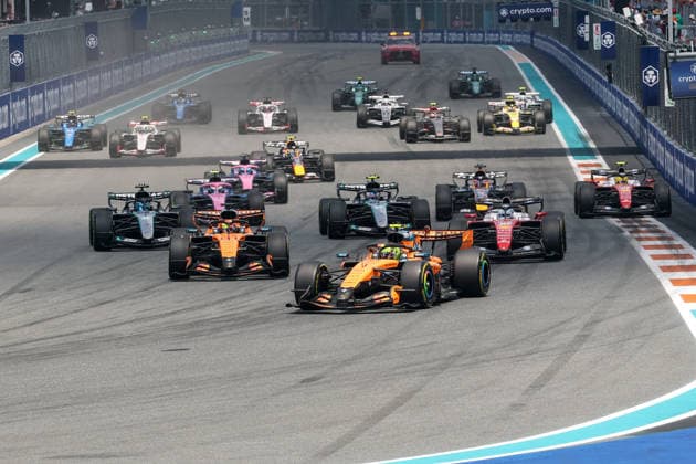 MIAMI GARDENS, FL - MAY 02: Lando Norris (1) of Great Britain and McLaren Mastercard F1 Team leads the drivers into turn one on the opening lap of the Sprint Race of the Formula 1 Crypto.com Grand Prix on May 2, 2026, at Miami International Autodrome in Miami Gardens, Florida. (Photo by David Buono Icon Sportswire) AUTO: MAY 02 F1 Miami Grand Prix EDITORIAL USE ONLY Icon2605020241