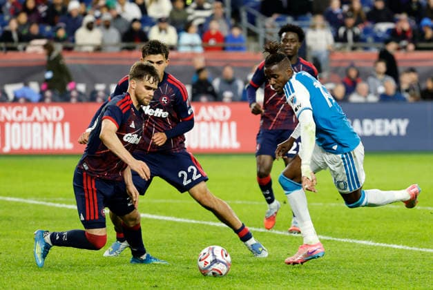 FOXBOROUGH, MA - MAY 02: Will Sands 23 of the New England Revolution and Wilfried Zaha 10 of the Charlotte FC vie for the ball during a match between the New England Revolution and Charlotte FC on May 2, 2026, at Gillette Stadium in Foxborough, Massachusetts. (Photo by Fred Kfoury III Icon Sportswire) SOCCER: MAY 02 MLS, Fussball Herren, USA New England Revolution vs Charlotte FC EDITORIAL USE ONLY Icon482260502023
