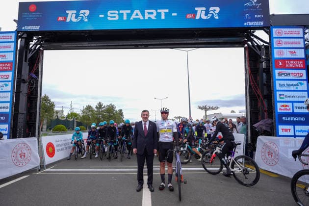 61st Presidential Cycling Tour of Turkiye ANKARA, TURKIYE - MAY 3: Turkish Vice President Cevdet Yilmaz poses for a photo with cyclists ahead of the eighth stage of the Presidential Cycling Tour of Turkiye 2026 (TUR 2026) on the Ankara-Ankara route in Ankara, Turkiye, on May 3, 2026. The race, held for the 61st time, is included in the Union Cycliste Internationale (UCI) Europe Tour calendar and is Turkiye’s only event in the ProSeries category. Yasin Baturhan Ergin Anadolu Ankara Turkey. Editorial use only. Please get in touch for any other usage.  Copyright: x2026xAnadoluxYasinxBaturhanxErginx