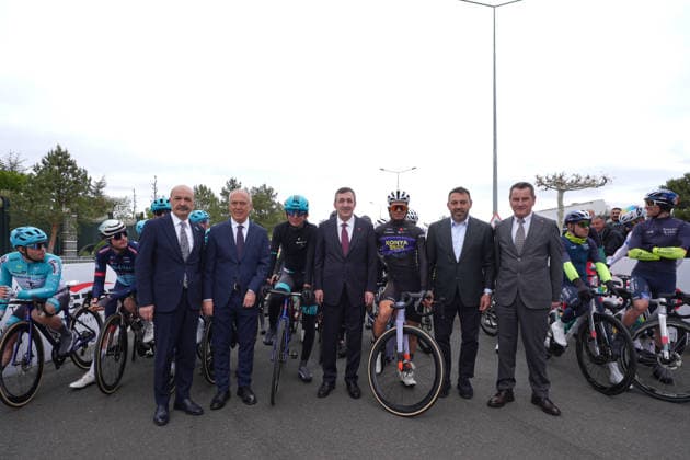 61st Presidential Cycling Tour of Turkiye ANKARA, TURKIYE - MAY 3: Turkish Vice President Cevdet Yilmaz poses for a photo with cyclists ahead of the eighth stage of the Presidential Cycling Tour of Turkiye 2026 (TUR 2026) on the Ankara-Ankara route in Ankara, Turkiye, on May 3, 2026. The race, held for the 61st time, is included in the Union Cycliste Internationale (UCI) Europe Tour calendar and is Turkiye’s only event in the ProSeries category. Yasin Baturhan Ergin Anadolu Ankara Turkey. Editorial use only. Please get in touch for any other usage.  Copyright: x2026xAnadoluxYasinxBaturhanxErginx