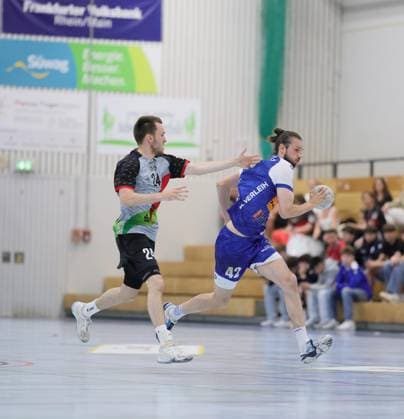 Germany Kelkheim Münster 02 05 2026 Handball Hessen 3 Liga Staffel Süd Herren 2025 2026 27 Matchday TSG Münster blue HLZ Friesenheim Hochdorf II gray v l Niclas Josten FRIESENHEIM II Nr 24 , Patrick Weber TSG MÜNSTER Nr 42 Sport TSG Münster HLZ Friesenheim Hochdorf II