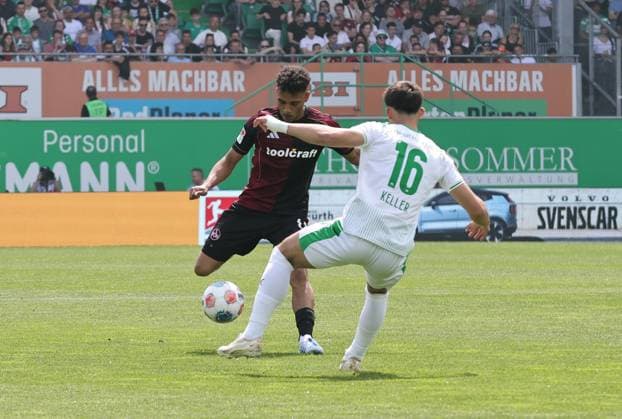 03 05 2026 Soccer Season 2025 2026 2 Soccer Bundesliga 32 Matchday SpVgg Greuther Fürth Kleeblatt 1 FC Nürnberg FCN Club Derby Frankenderby Sportfoto Zink DaMa xdaxmax DFL regulations prohibit any use of photographs as image sequences and or quasi video only for editorial use Henri Koudossou 8, 1 FC Nürnberg FCN Aaron Keller 16, SpVgg Greuther Fürth