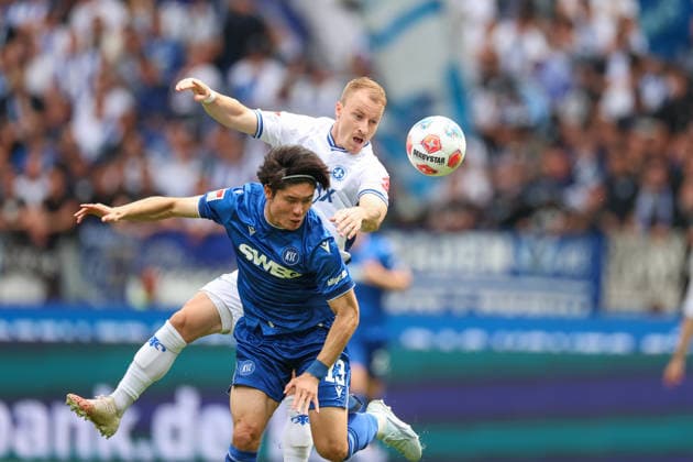 Fabian Holland SV Darmstadt 98, 32 in duel with Shio Fukuda Karlsruher SC, 13 , Karlsruher SC vs SV Darmstadt 98, 2 Bundesliga, 32 Matchday, 2025 2026, 03 05 2026, DFL REGULATIONS PROHIBIT ANY USE OF PHOTOGRAPHS AS IMAGE SEQUENCES AND OR QUASI VIDEO, Karlsruher SC vs SV Darmstadt 98, 2 Bundesliga, 32 Matchday, 2025 2026, 03 05 2026 Karlsruhe Copyright: xEibner-Pressefoto JanxPrihodax EP_JPA