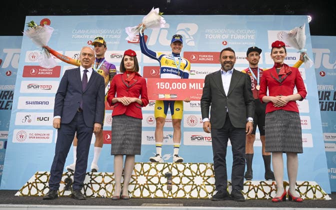61st Presidential Cycling Tour of Turkiye ANKARA, TURKIYE - MAY 3: Australian athlete Sebastian Berwick, Colombian athlete Ivan Ramiro Sosa and Belgian athlete Kamiel Bonneu are seen on the podium after winning first, second and third place respectively during the eighth stage of the Presidential Cycling Tour of Turkiye 2026 (TUR 2026) on the Ankara-Ankara route in Ankara, Turkiye, on May 3, 2026. The race, held for the 61st time, is included in the Union Cycliste Internationale (UCI) Europe Tour calendar and is Turkiye’s only event in the ProSeries category. The Australian cyclist Berwick also secured the turquoise jersey. Utku Ucrak Anadolu Ankara Turkey. Editorial use only. Please get in touch for any other usage.  Copyright: x2026xAnadoluxUtkuxUcrakx
