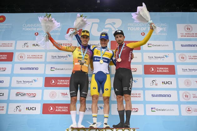 61st Presidential Cycling Tour of Turkiye ANKARA, TURKIYE - MAY 3: Australian athlete Sebastian Berwick, Colombian athlete Ivan Ramiro Sosa and Belgian athlete Kamiel Bonneu are seen on the podium after winning first, second and third place respectively during the eighth stage of the Presidential Cycling Tour of Turkiye 2026 (TUR 2026) on the Ankara-Ankara route in Ankara, Turkiye, on May 3, 2026. The race, held for the 61st time, is included in the Union Cycliste Internationale (UCI) Europe Tour calendar and is Turkiye’s only event in the ProSeries category. The Australian cyclist Berwick also secured the turquoise jersey. Utku Ucrak Anadolu Ankara Turkey. Editorial use only. Please get in touch for any other usage.  Copyright: x2026xAnadoluxUtkuxUcrakx