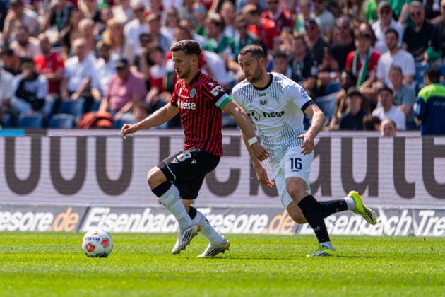 Hannover, Germany 03 May 2026 2 BL 2025 2026 Sp 32 Hannover 96 v Preußen Münster Pictured from left in duel Enzo Leopold HAN and Torge Paetow PRM DFL DFB regulations prohibit any use of photographs as image sequences and or quasi video Heinz von Heiden Arena Niedersachsen Copyright: xFotostandx xKruczynskix