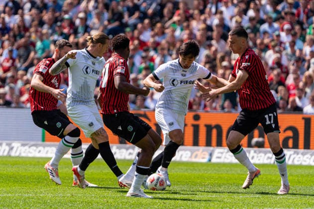Hannover, Germany 03 May 2026 2 BL 2025 2026 Sp 32 Hannover 96 v Preußen Münster Pictured from left in duel Boris Tomiak HAN , Marvin Schulz PRM , Ime Daniel Okon HAN , Shin Yamada PRM and Bastian Allgeier HAN DFL DFB regulations prohibit any use of photographs as image sequences and or quasi video Heinz von Heiden Arena Niedersachsen Copyright: xFotostandx xKruczynskix