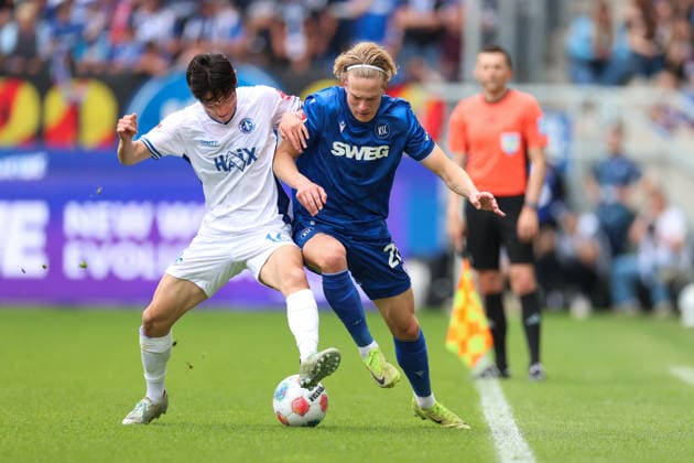 Hiroki Akiyama SV Darmstadt 98, 16 in duel with David Herold Karlsruher SC, 20 , Karlsruher SC vs SV Darmstadt 98, 2 Bundesliga, 32 Matchday, 2025 2026, 03 05 2026, DFL REGULATIONS PROHIBIT ANY USE OF PHOTOGRAPHS AS IMAGE SEQUENCES AND OR QUASI VIDEO, Karlsruher SC vs SV Darmstadt 98, 2 Bundesliga, 32 Matchday, 2025 2026, 03 05 2026 Karlsruhe Copyright: xEibner-Pressefoto JanxPrihodax EP_JPA