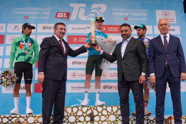 61st Presidential Cycling Tour of Turkiye ANKARA, TURKIYE - MAY 3: Australian athlete Sebastian Berwick, Colombian athlete Ivan Ramiro Sosa and Belgian athlete Kamiel Bonneu are seen on the podium after winning first, second and third place respectively during the eighth stage of the Presidential Cycling Tour of Turkiye 2026 (TUR 2026) on the Ankara-Ankara route in Ankara, Turkiye, on May 3, 2026. The race, held for the 61st time, is included in the Union Cycliste Internationale (UCI) Europe Tour calendar and is Turkiye’s only event in the ProSeries category. The Australian cyclist Berwick also secured the turquoise jersey. Yasin Baturhan Ergin Anadolu Ankara Turkey. Editorial use only. Please get in touch for any other usage.  Copyright: x2026xAnadoluxYasinxBaturhanxErginx