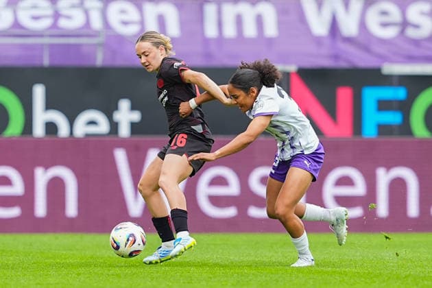 03 05 2026, xydrx, Women, Soccer, 1 Women Bundesliga, SGS Essen Bayer 04 Leverkusen, Season 2025 2026, Stadion an der Hafenstraße Sofie Lena Zdebel Bayer 04 Leverkusen, 16 in duel against Ella Emilie Touon Mbenoun SGS Essen, 32 DFB regulations prohibit any use of photographs as image sequences and or quasi video Copyright: HMBxMedia YannisxDreimann