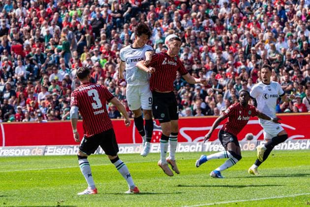 Hannover, Germany 03 May 2026 2 BL 2025 2026 Sp 32 Hannover 96 v Preußen Münster Pictured from left in duel Shin Yamada PRM and Bastian Allgeier HAN DFL DFB regulations prohibit any use of photographs as image sequences and or quasi video Heinz von Heiden Arena Niedersachsen Copyright: xFotostandx xKruczynskix