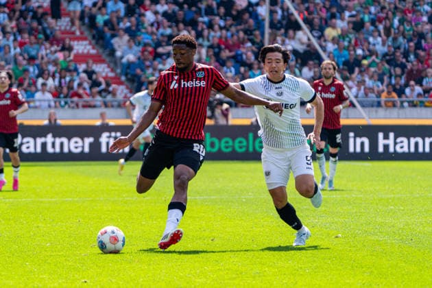 Hannover, Germany 03 May 2026 2 BL 2025 2026 Sp 32 Hannover 96 v Preußen Münster Pictured from left in duel Ime Daniel Okon HAN and Shin Yamada PRM DFL DFB regulations prohibit any use of photographs as image sequences and or quasi video Heinz von Heiden Arena Niedersachsen Copyright: xFotostandx xKruczynskix