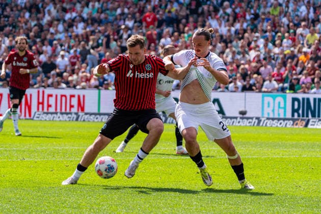 Hannover, Germany 03 May 2026 2 BL 2025 2026 Sp 32 Hannover 96 v Preußen Münster Pictured from left in duel Benjamin Kaellman Källman HAN and Jannis Heuer PRM DFL DFB regulations prohibit any use of photographs as image sequences and or quasi video Heinz von Heiden Arena Niedersachsen Copyright: xFotostandx xKruczynskix