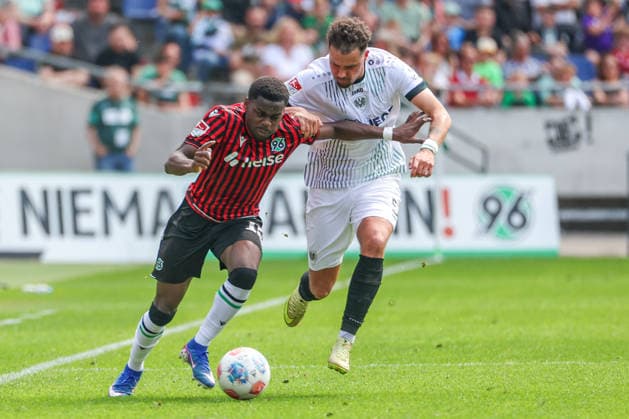 2 Bundesliga Hannover 96 SC Preußen Münster on 03 05 2026 at Heinz von Heiden Arena in Hannover Noel Aseko Nkili Hannover 15 vs Yassine Bouchama Muenster 5 MH