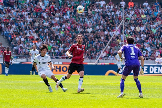 Hannover, Germany 03 May 2026 2 BL 2025 2026 Sp 32 Hannover 96 v Preußen Münster Pictured from left in duel Shin Yamada PRM , Boris Tomiak HAN and goalkeeper Nahuel Nicolas Noll HAN DFL DFB regulations prohibit any use of photographs as image sequences and or quasi video Heinz von Heiden Arena Niedersachsen Copyright: xFotostandx xKruczynskix