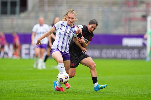 03 05 2026, xydrx, Women, Football, 1 Womens Bundesliga, SGS Essen Bayer 04 Leverkusen, Season 2025 2026, Stadion an der Hafenstraße Maike Berentzen SGS Essen, 13 in duel against Ruby Grant Bayer 04 Leverkusen, 22 DFB regulations prohibit any use of photographs as image sequences and or quasi video Copyright: HMBxMedia YannisxDreimann