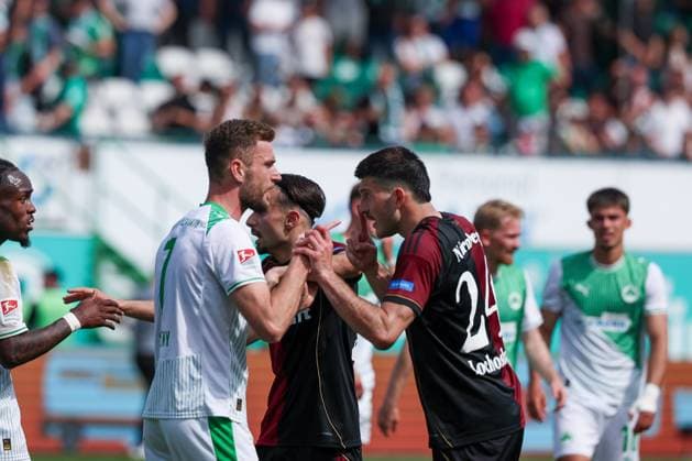 Dennis Srbeny 7 Spvgg Greuther Fuerth , Berkay YÄ±lmaz 21 1FC Nuernberg , Luca Lochosvili 24 1FC Nuernberg and Noel Futkeu 9 Spvgg Greuther Fuerth argue after the end of the match, emotions, SpVgg Greuther Fuerth vs 1 FC Nuernberg, Football, Men, 2 Bundesliga, DFL, Season 2025 2026, Matchday 32, Second round, 03 05 2026 DFB regulations prohibit any use of photographs as image sequences and or quasi video Fuerth Bayern Germany Copyright: xkolbert-press MartinxAgüerax