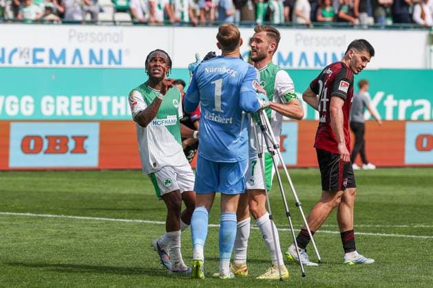 Dispute between Noel Futkeu 9 Spvgg Greuther Fuerth , Jan Reichert 1 1FC Nuernberg and Dennis Srbeny 7 Spvgg Greuther Fuerth after the end of the match, SpVgg Greuther Fuerth vs 1 FC Nuernberg, Football, Men, 2 Bundesliga, DFL, Season 2025 2026, 32 Matchday, Second round, 03 05 2026 DFB regulations prohibit any use of photographs as image sequences and or quasi video Fuerth Bayern Germany Copyright: xkolbert-press MartinxAgüerax